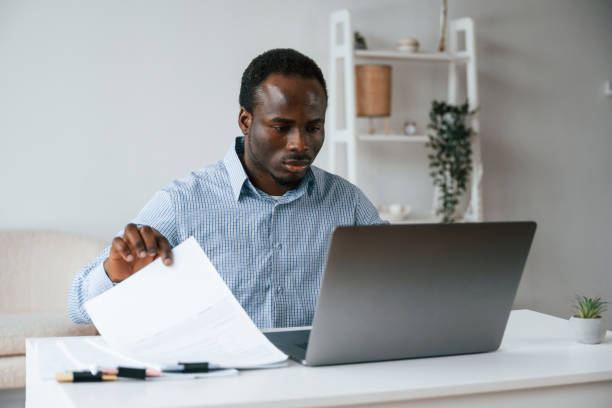 istock Businessman is working in the office by laptop 2032237650