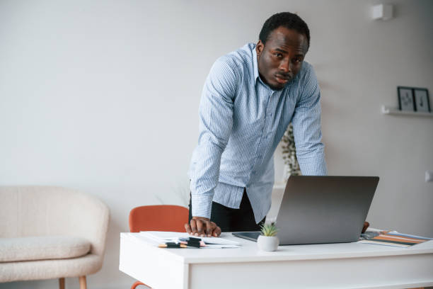 istock Businessman is working in the office by laptop 2032238708