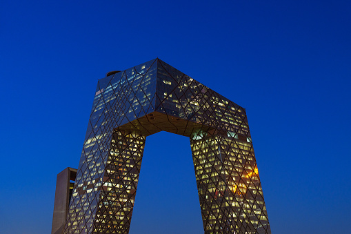The new CCTV (China Central Television) Tower is called Dakucha (big underpants) by local people because of its facade. It’s huge and shows a special charms under the night light.