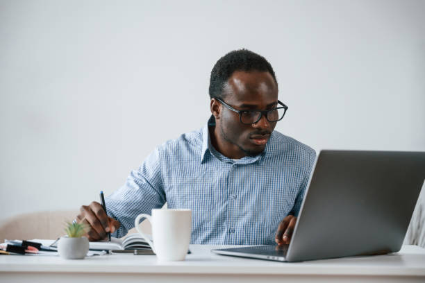 istock Manager is using laptop. Businessman is working in the office 2032240306