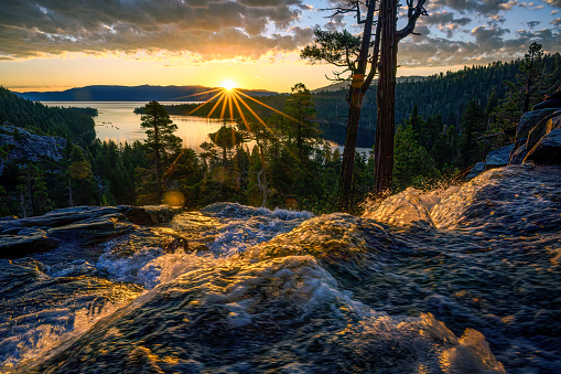 Sunrise above Lower Eagle Falls with Emerald Bay in the background, Lake Tahoe, California.