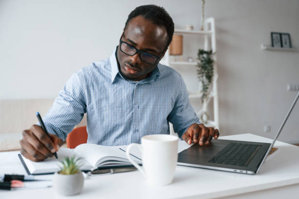 istock Businessman is working in the office by laptop 2032245681