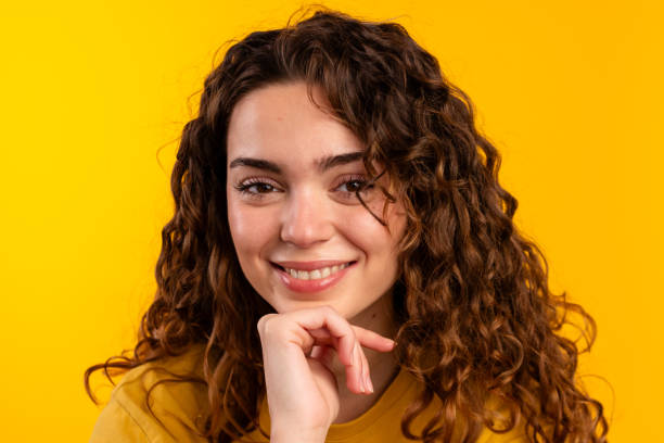istock Thoughtful Woman with Hand on Chin 2032259749