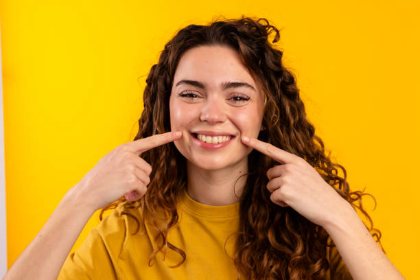 Joyful Woman Gesturing Cheeky Smile