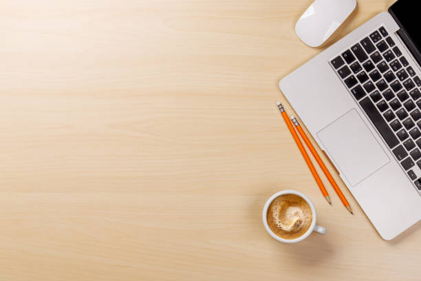 istock Workplace essentials: Laptop, coffee, supplies 2032268362