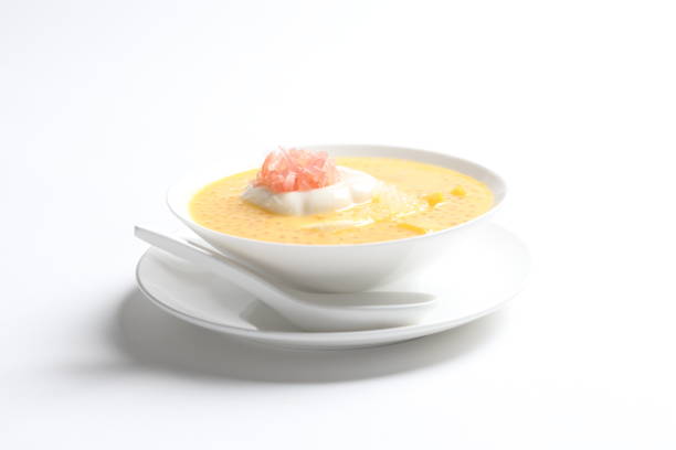 istock chilled mango sago fruit with pink pomelo and soya pudding jelly in white bowl on white background asian cafe sweet dessert halal menu 2032289573