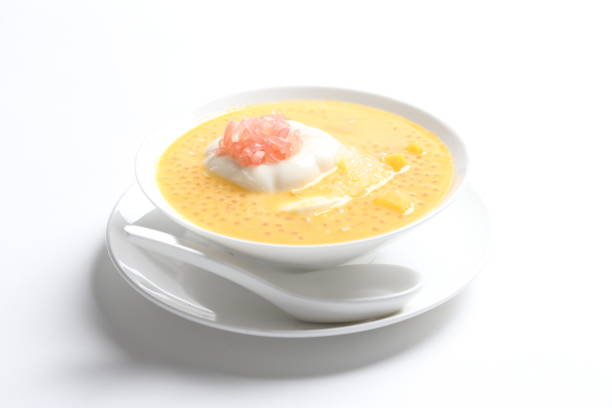 istock chilled mango sago fruit with pink pomelo and soya pudding jelly in white bowl on white background asian cafe sweet dessert halal menu 2032290052