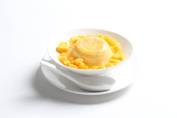 istock chilled mango sago fruit with pomelo and mango pudding jelly in bowl on white table sweet dessert halal menu asian cafe 2032292835