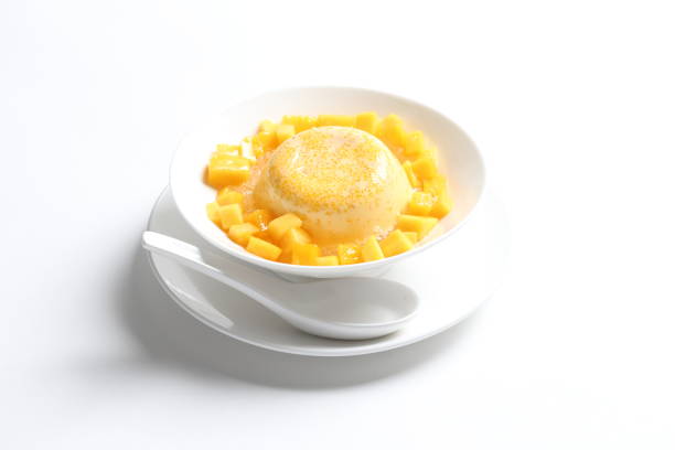 istock chilled mango sago fruit with pomelo and mango pudding jelly in bowl on white table sweet dessert halal menu asian cafe 2032292926