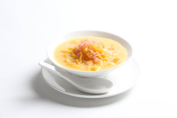 istock chilled mango sago fruit with pomelo and mango pudding jelly in bowl on white table sweet dessert halal menu asian cafe 2032293900