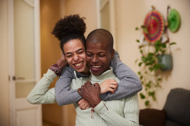 istock Radiant Resilience: Mother and Daughter Share a Smiling Embrace 2032299452