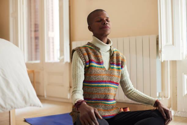 istock Serene Meditation: Woman Engages in Prayer with Closed Eyes 2032300455