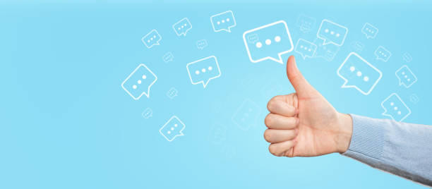 istock Social network and feedback concept. Send a message with my finger. Talk or comment sign symbol on blue background. 2032328320