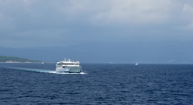 Car ferry boat in Greece linking the island Corfu to mainland transporting goods and vehicles
