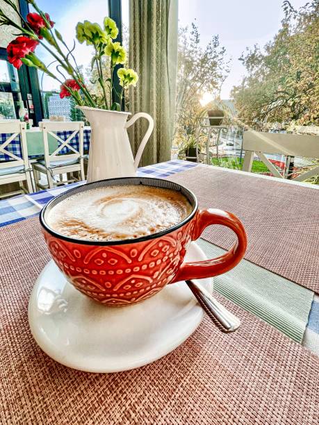 istock A cup of coffee on a table 2032369116