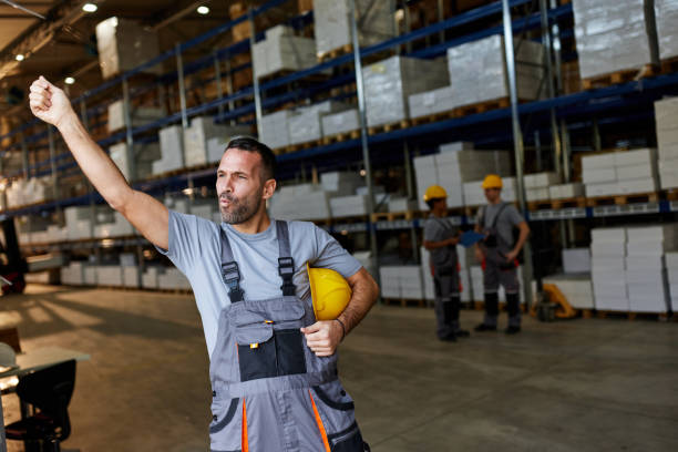 istock Male worker having fun in storage room. 2032383873