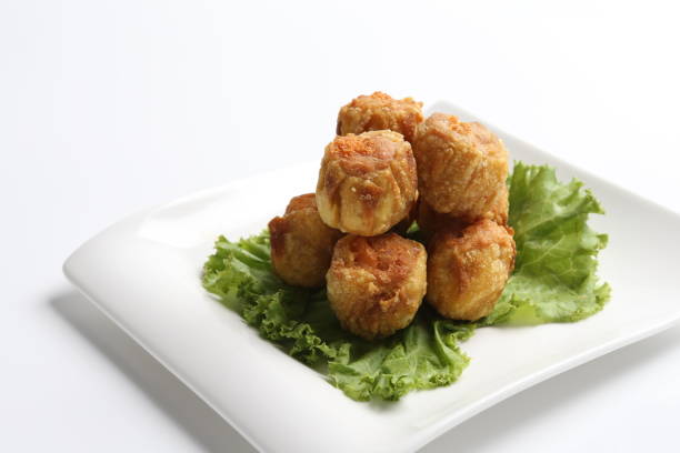 istock deep fried pork chicken siew mai meat ball dim sum in plate on white background appetiser food snack halal menu for Hong Kong cafe 2032384396