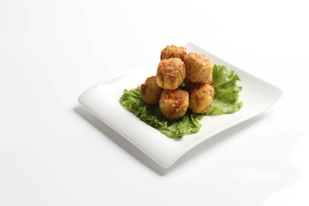 istock deep fried pork chicken siew mai meat ball dim sum in plate on white background appetiser food snack halal menu for Hong Kong cafe 2032384399