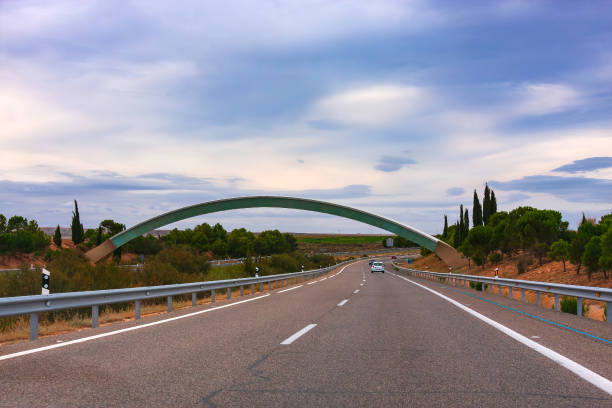 on the highway in Spain. Greenwich meridian is ahead