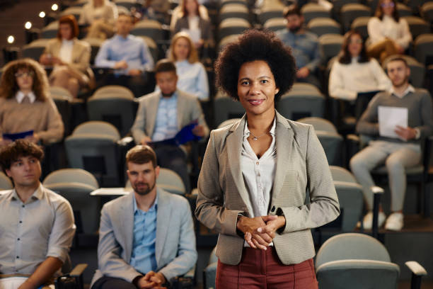 istock Happy black public speaker on education event at convention center. 2032403641