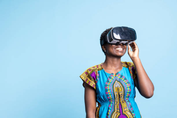 istock Young cheerful person enjoying artificial intelligence on vr glasses 2032413244