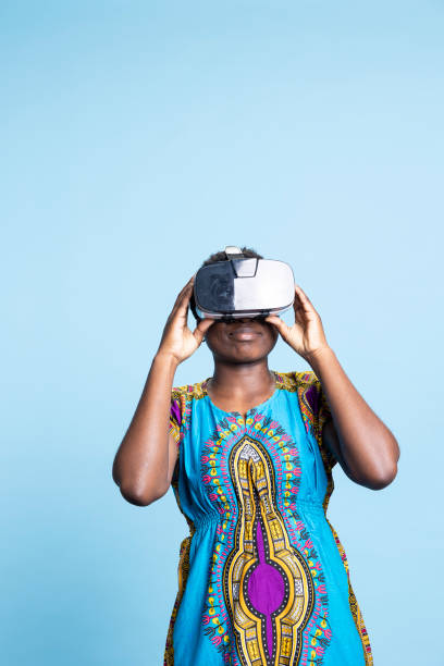 istock Modern woman wearing virtual reality glasses with 3d interactive vision 2032413258