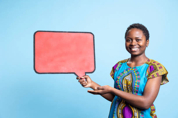 istock Female model creating commercial ad with red speech bubble 2032418661