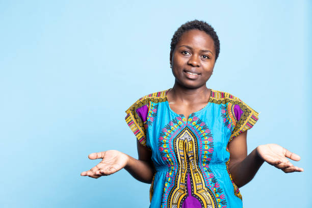 istock African american female model feeling doubtful and confused in studio 2032429526