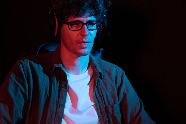 istock Streamer concentrated with Esport team on computer with harder game. Gusher. 2032430670