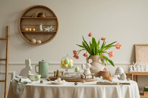 Beautiful and stylish dining room interior. The magic of the holidays. Easter table with decorations. Template.