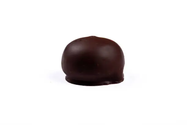 Photo of Delicious Mozartkugel Chocolate Candy on White Background - Tempting Sweet Treat