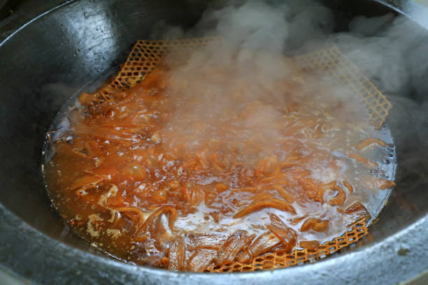 istock Chinese traditional dishes in pot stew cooking 2032468377