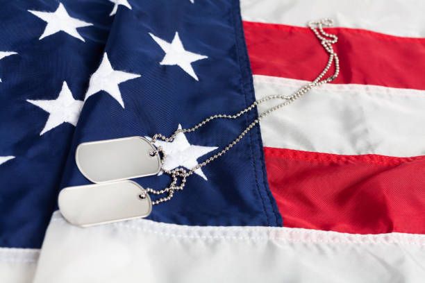 istock US army dog tags on USA national flag 2032485865
