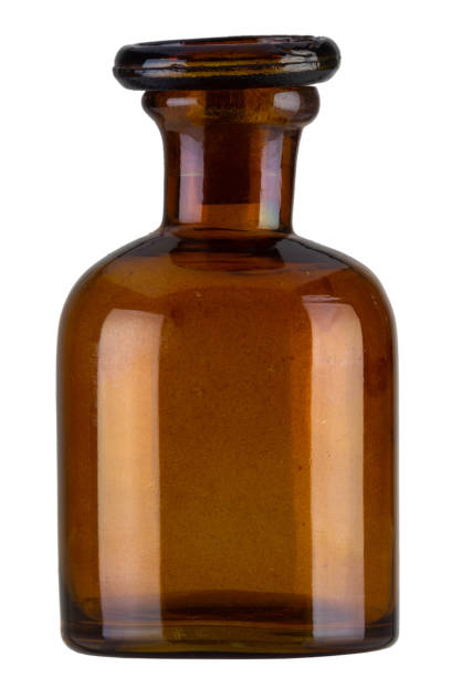 bottle of apple cider vinegar against white background