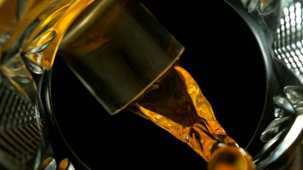 istock Speed motion of pouring whiskey into glass 2032490358