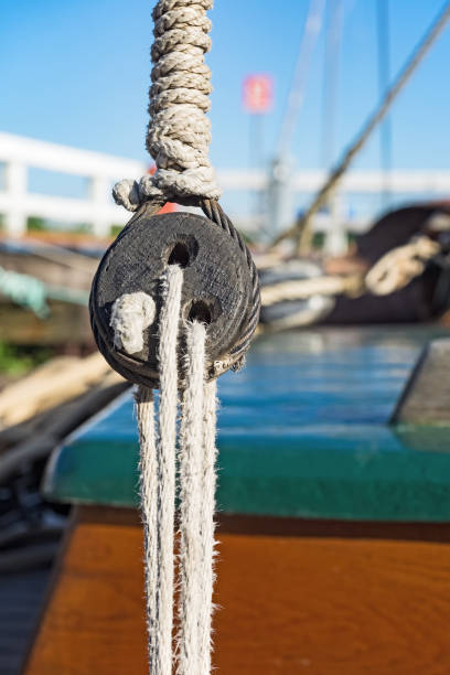 Sailing boat pulley, block and tackle with nautical rope.