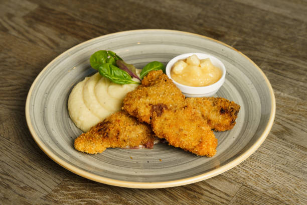istock Fried fish with mashed potatoes and quince apple jam 2032511769