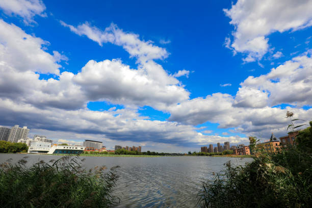 Sunny waterfront urban architectural scenery, North China