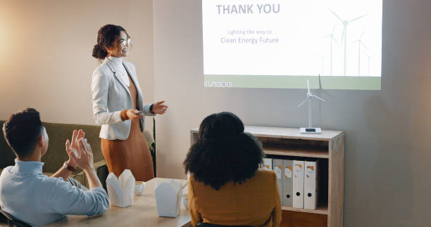 istock Applause, woman and presentation with workshop, eco friendly and research with corporate training, conference and review. Person, presenter and group with sustainability, feedback and energy seminar 2032556446