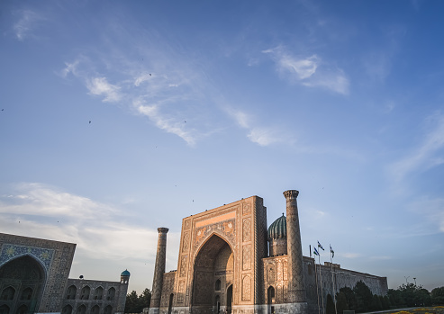 Registan Square, Ulugbek Madrasah, Sherdor Mosque Madrasah and Tillya-Kari Madrasah in the ancient city of Samarkand in Uzbekistan, oriental architecture