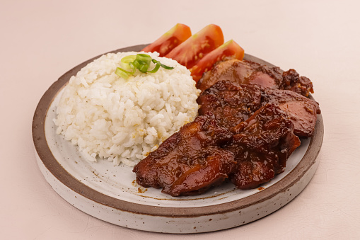 Lamb meat dish with nuts, pomegranate and dried figs in a diner in Kuwait City