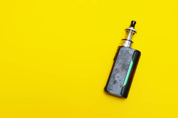 istock vaporizer vape isolated on yellow background 2032614189