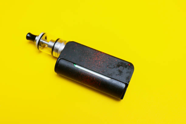 istock vaporizer vape isolated on yellow background 2032614201