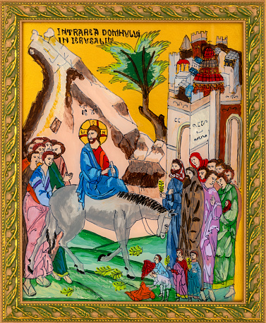 Framed icon painted on reverse glass in the naive orthodox style of Eastern Europe depicting Jesus triumphal entry into Jerusalem.