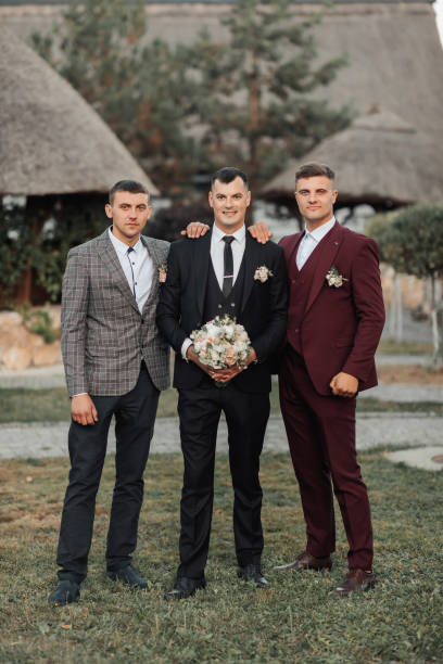 istock Photo of three men in classic suits. 2032621027