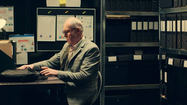 istock Private inspector opening laptop to cross examine forensic evidence 2032623369