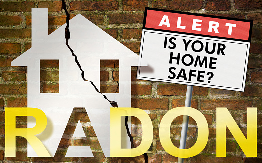 Is your home radon safe? - Alert radon gas concept with home icon and text written on sign