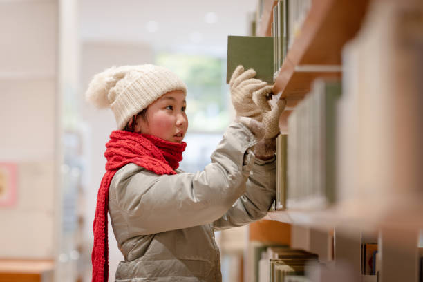 girl choosing a book