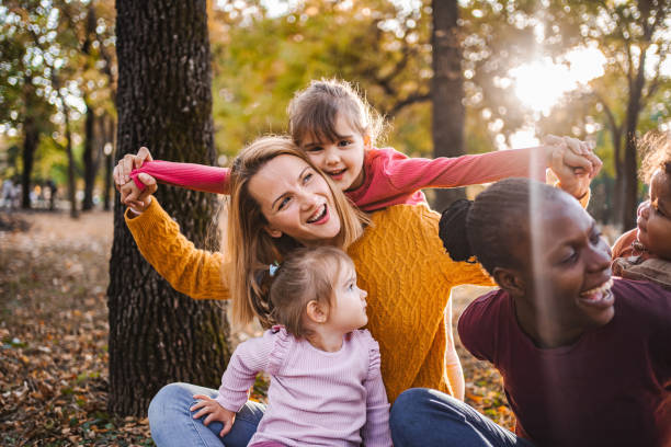 istock Golden Moments: Laughter and Love in the Park 2032784608