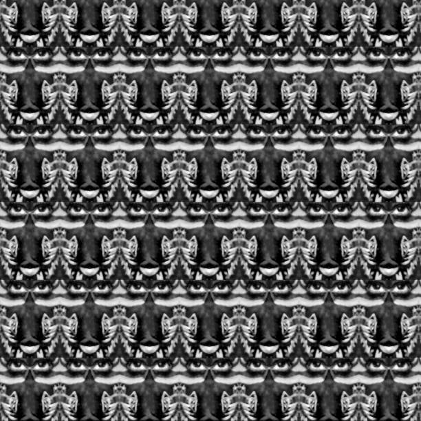 istock Tribal mask motif creepy black and white pattern 2032817920
